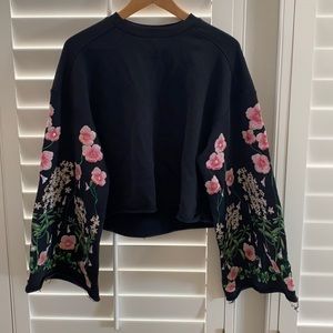 H&M sweatshirt material with embroidered sleeves